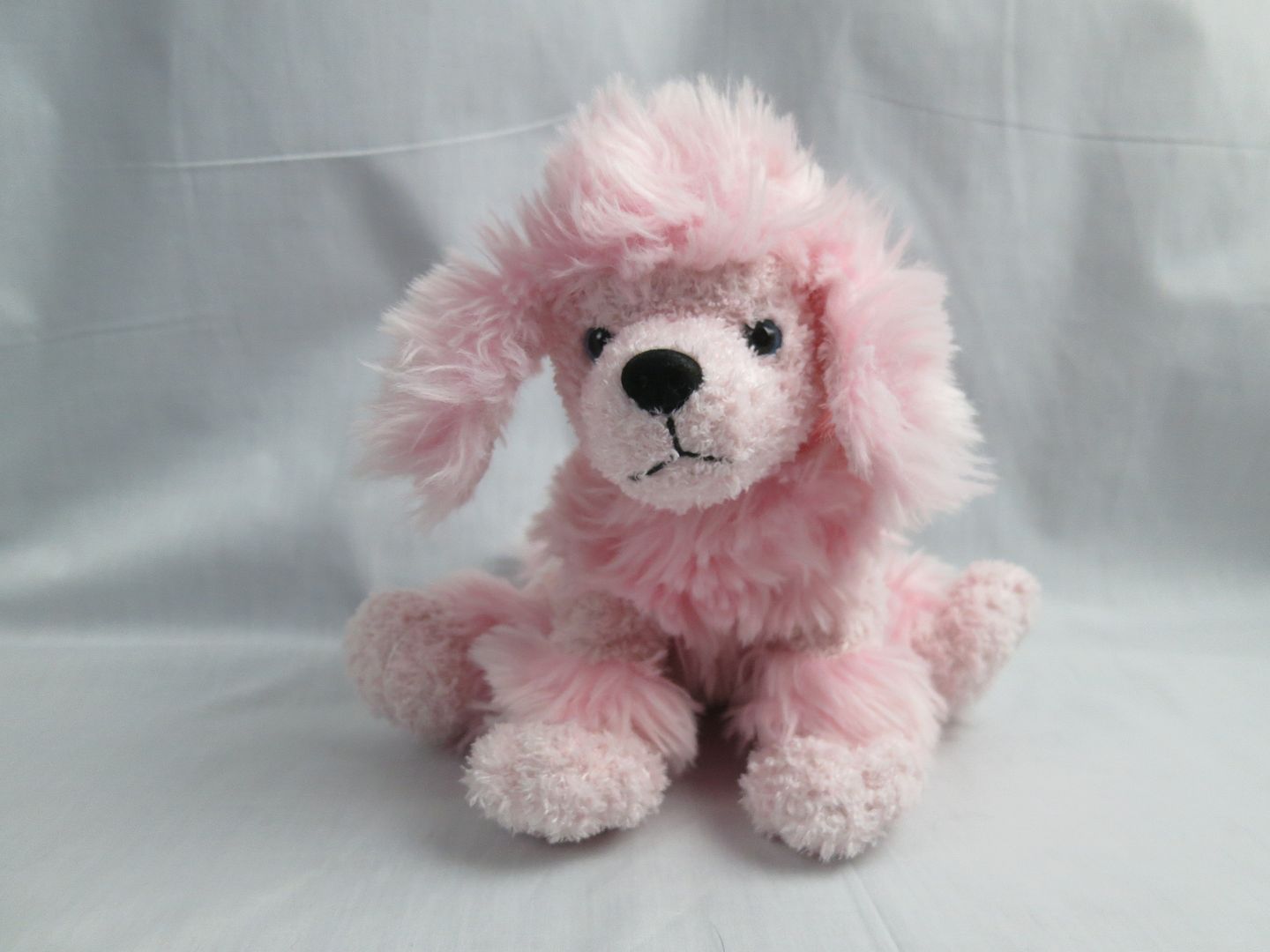 large pink poodle stuffed animal